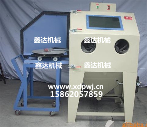 轉(zhuǎn)臺(tái)噴砂機(jī)